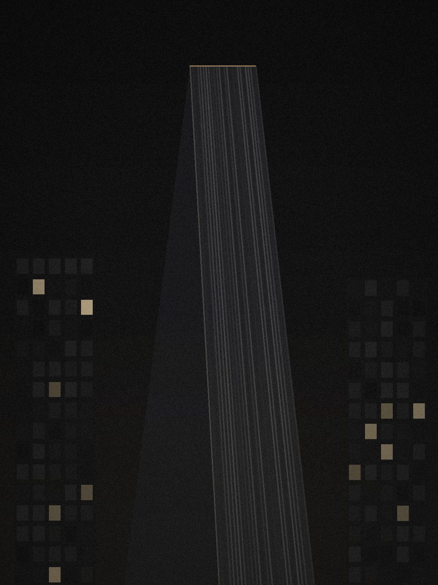 Tapering glass tower at night